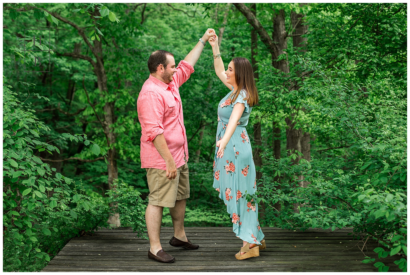 Engagement Photo of Couple Dancing in the forest in Wellsburg West Virginia