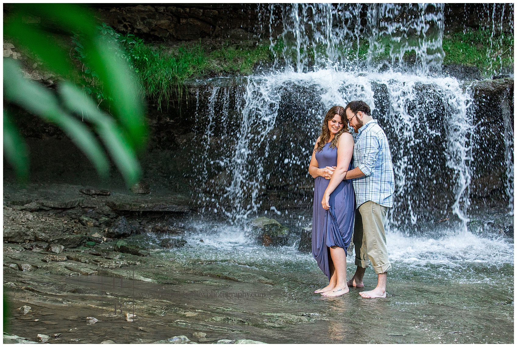 Couple Standing in Oglebay Waterfall for Engagement Photos
