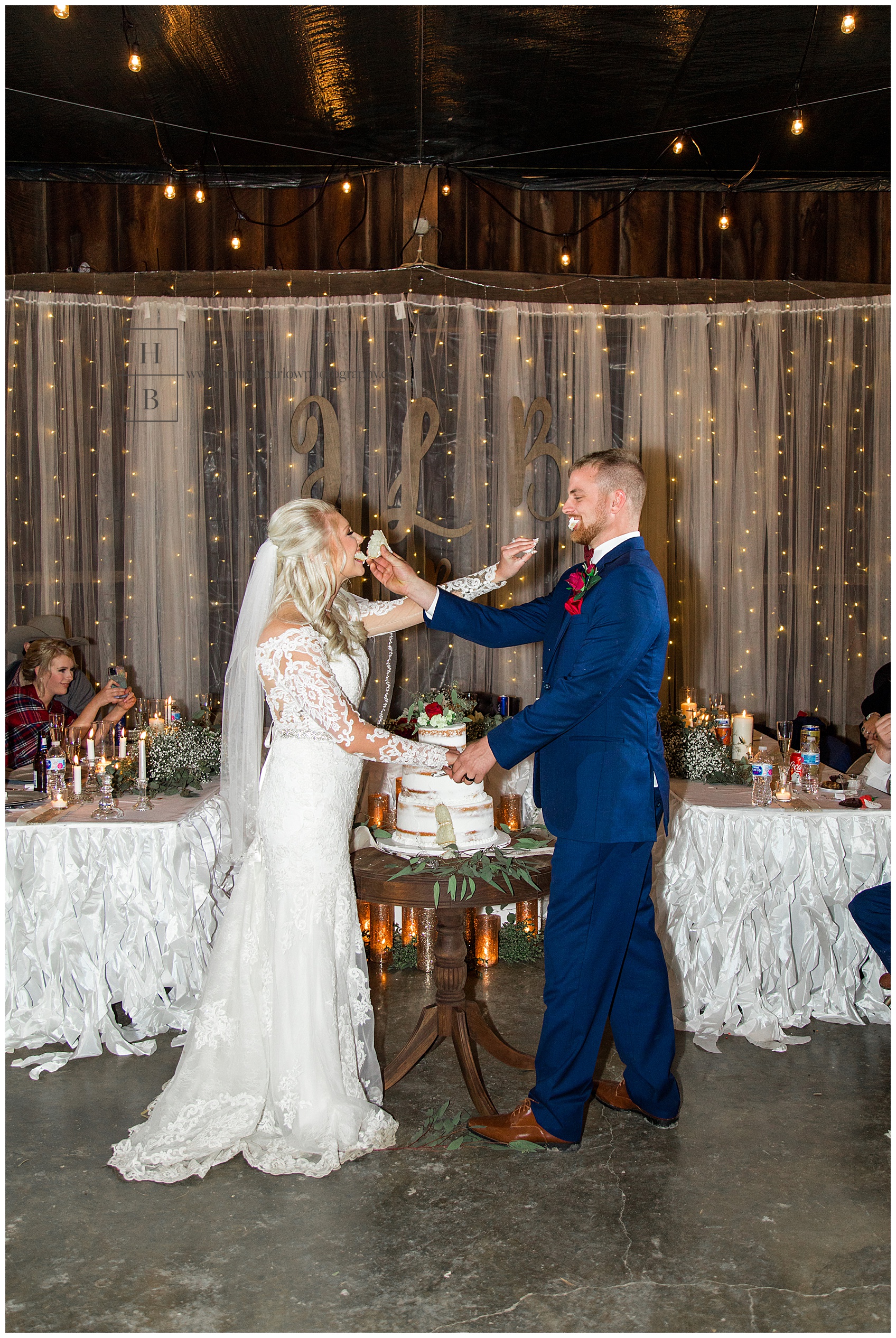 Bride and Groom Feeding Each Other Cake