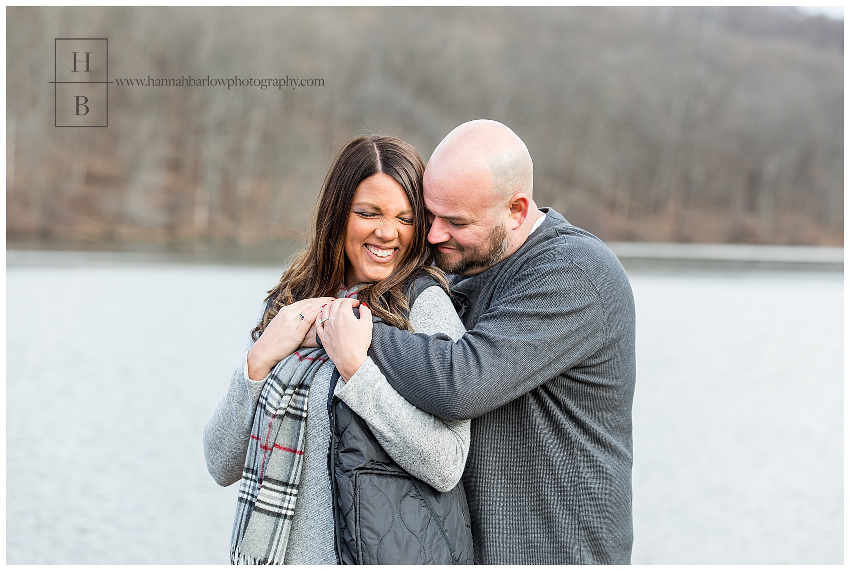 Couple Cuddling for Engagement Photos by Lake