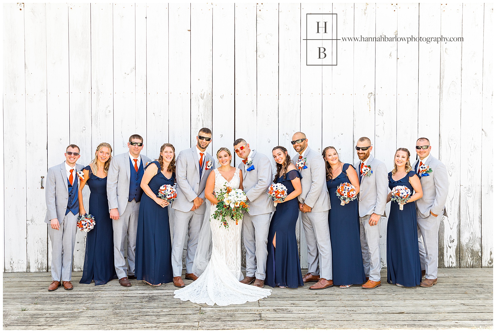 Bridal Party in Front of White Barn at Renshaw Farms
