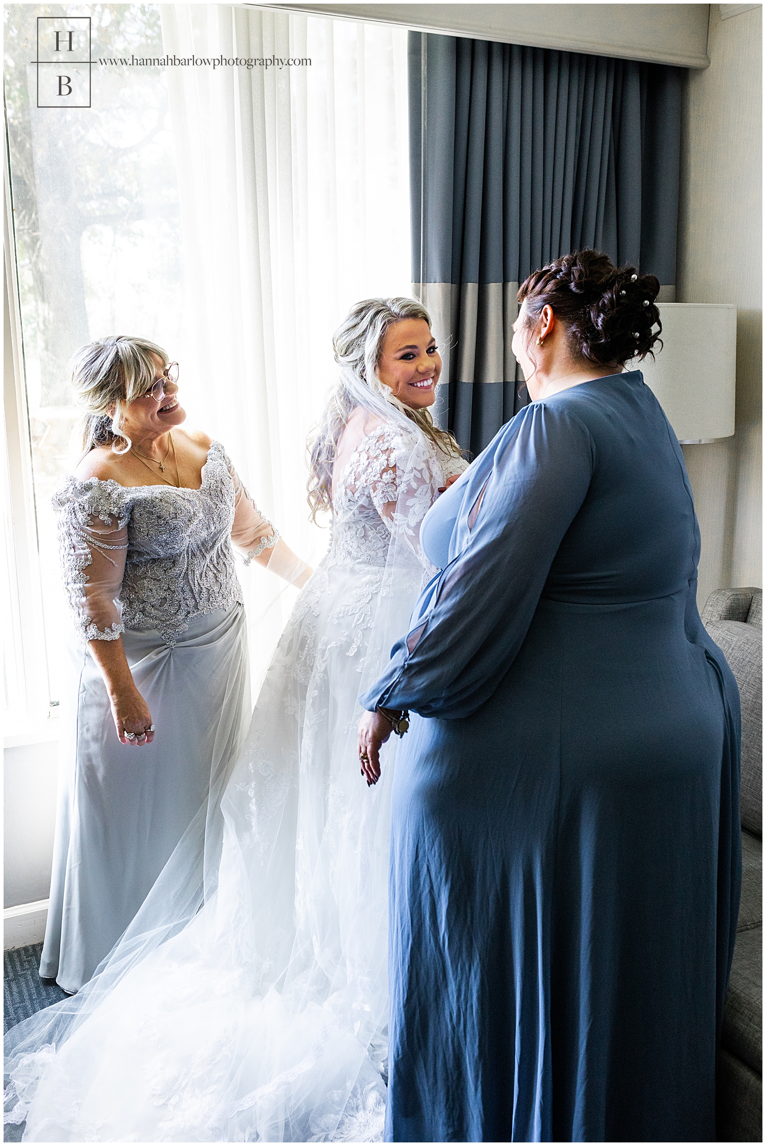 Bride with Mother of the Bride and Mother of the Groom Getting Ready