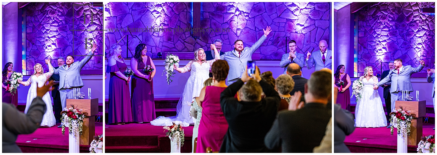 Bride and Groom Celebrate Being Married with Arms in Air