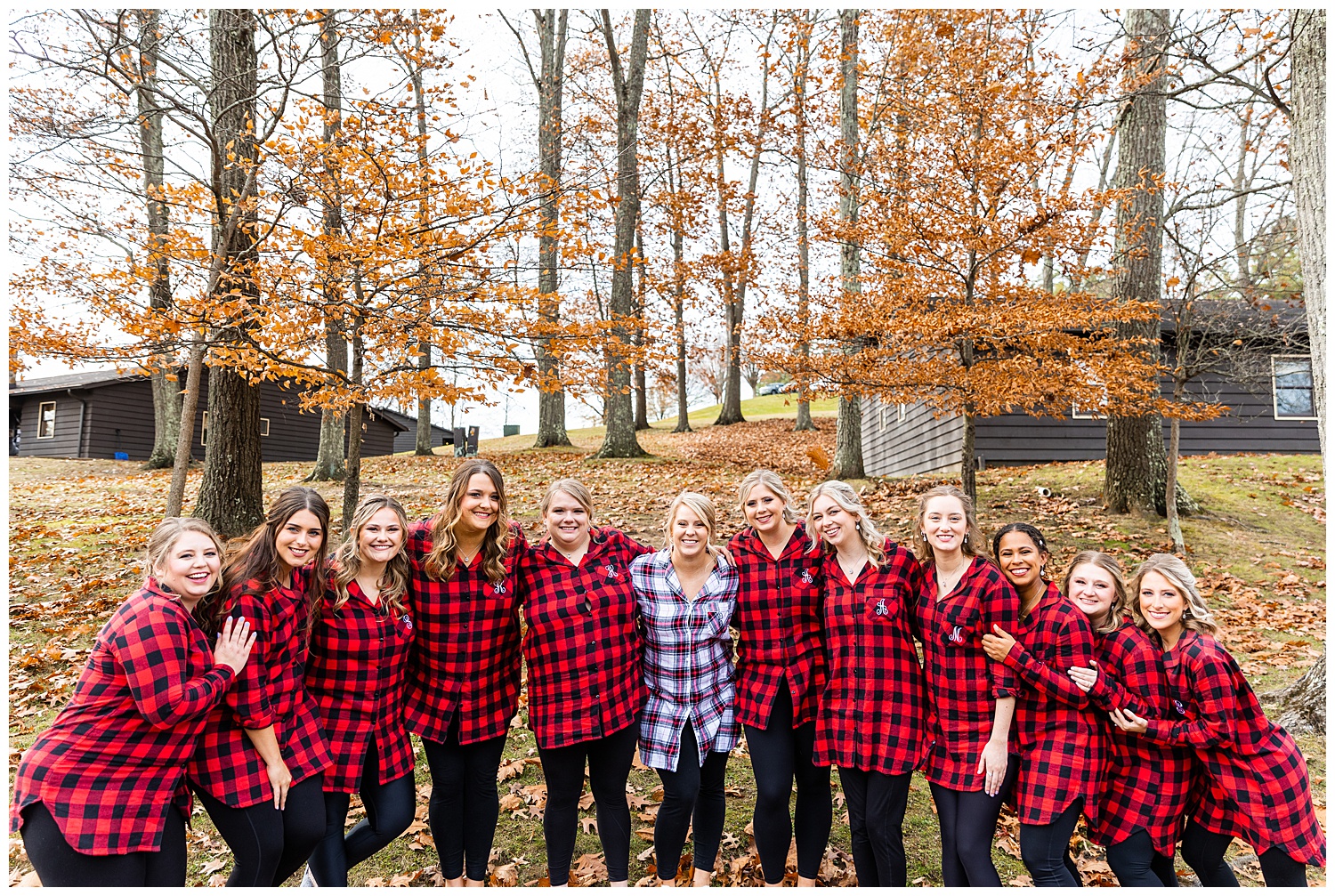 Bride and bridesmaids pose in red flannel tops