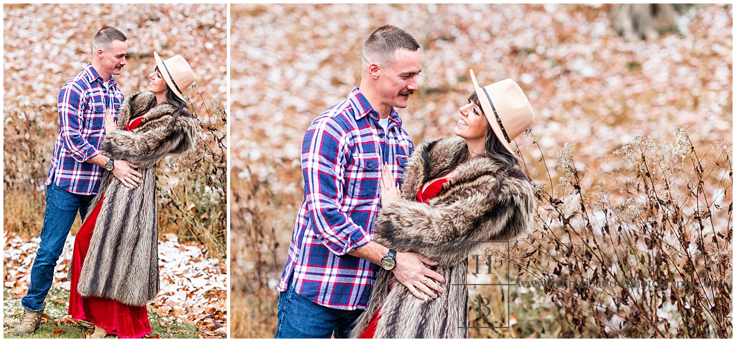 Man in blue flannel shirt dips fiance in red dress and fur coat.