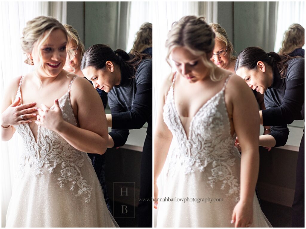 Wedding photographer helps bride button dress