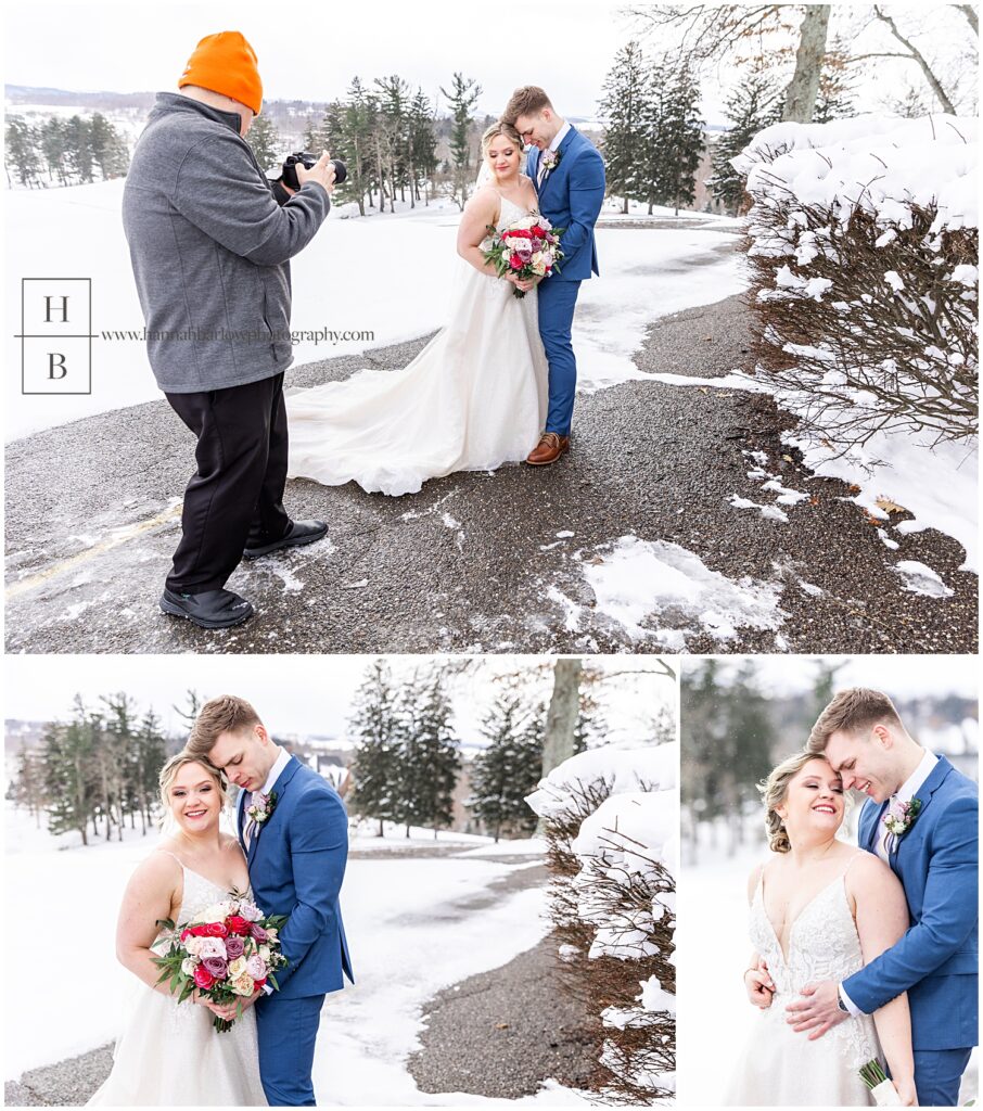 Wedding photographer takes photo of bride and groom in snow