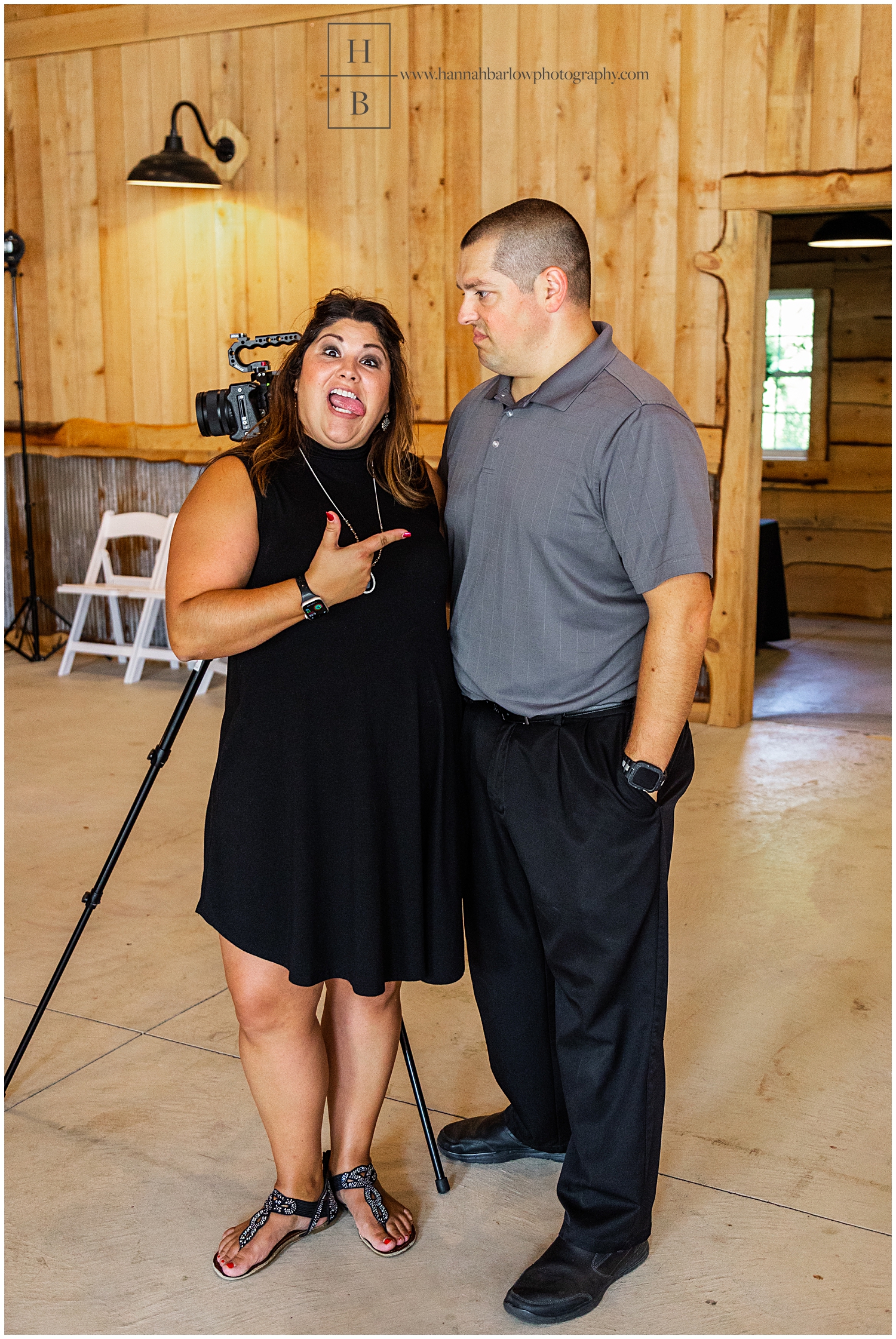 Videographers make funny faces at one another.
