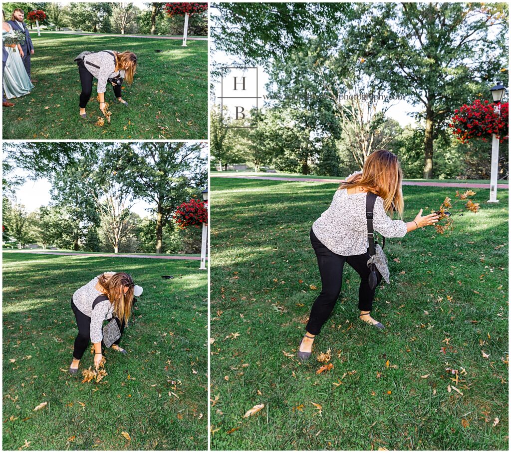 Wedding photographer uses stick to remove deer poop from grass.