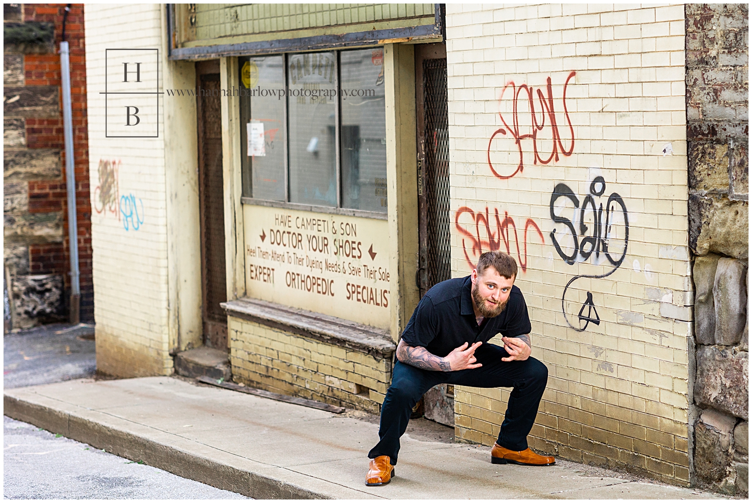 Outtakes of future groom posing by old shoe shop.