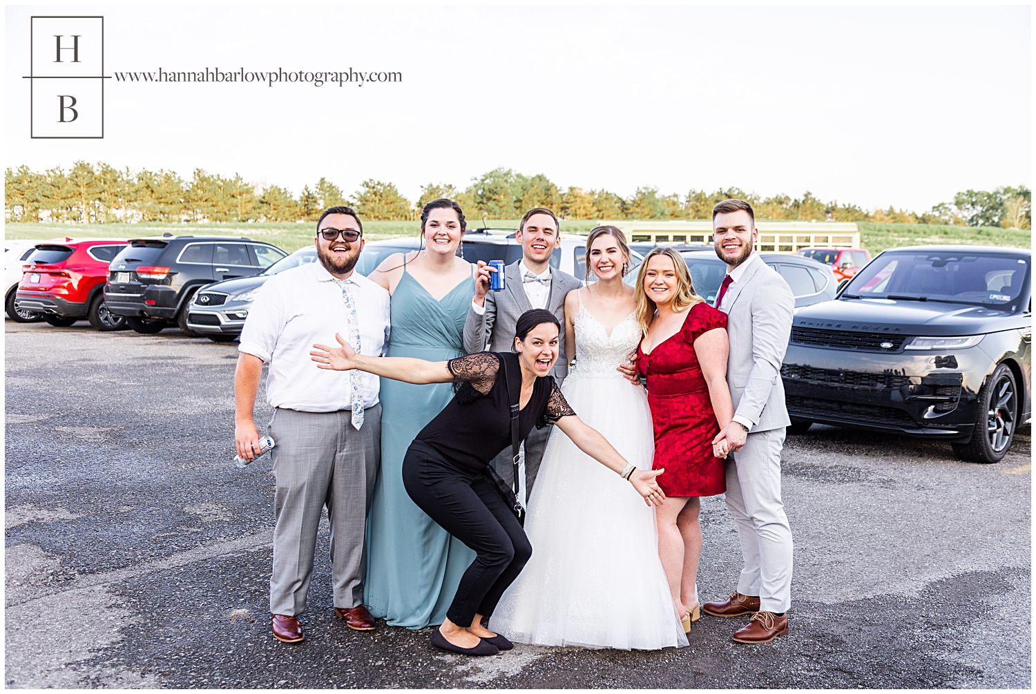 Photographer poses with three couples she's photographed weddings for.