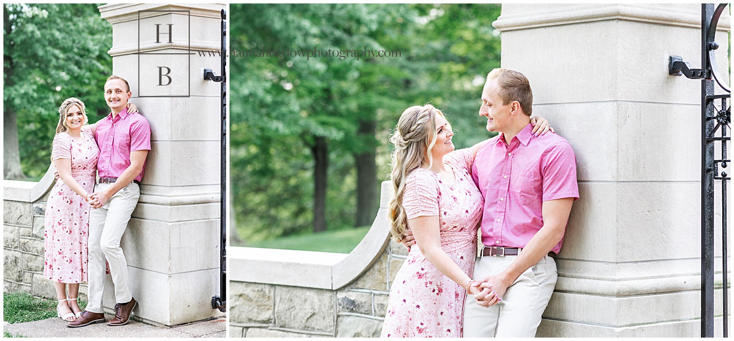Women embraces fiancé in pink shirt for engagement photos.