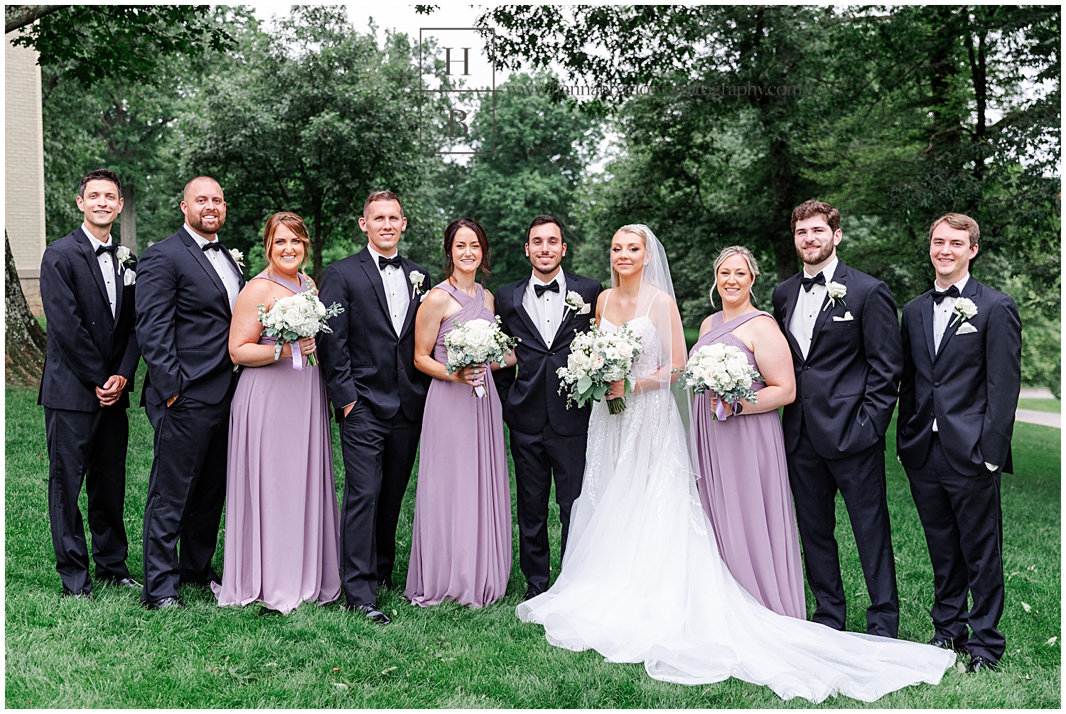 Bridal party poses for group photo.