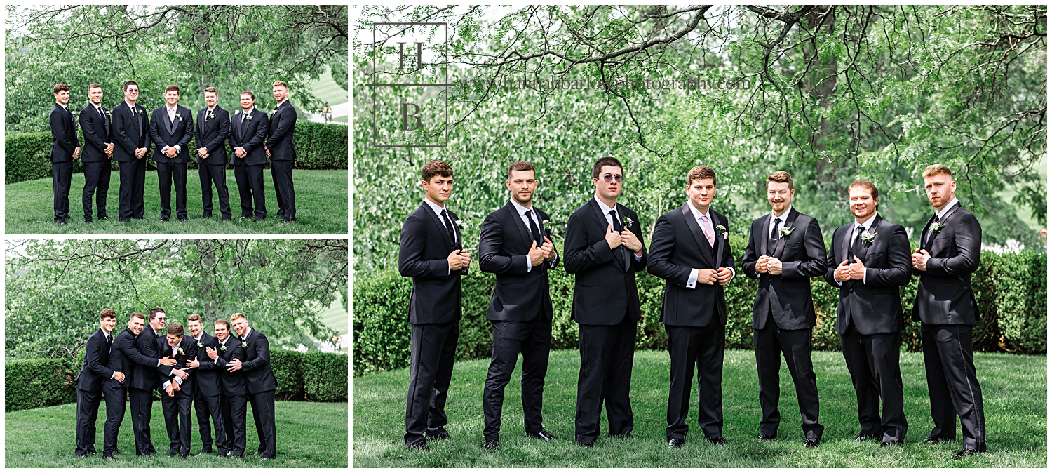 Groom and Groomsmen in black tuxes pose for photos.