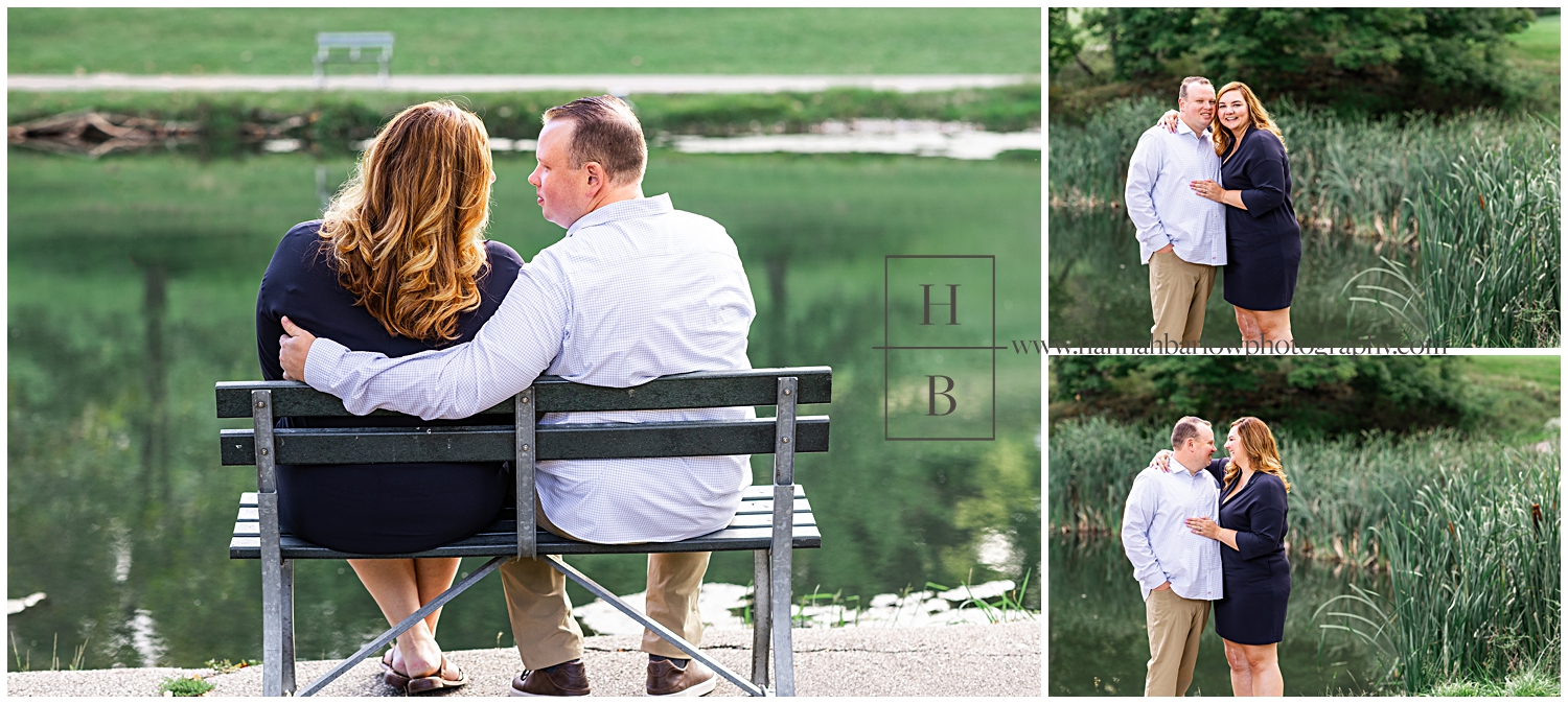 Couple sits on bench and look at one another by lake.