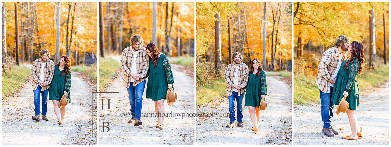 Couples embraces and laughs for fall engagement photos.