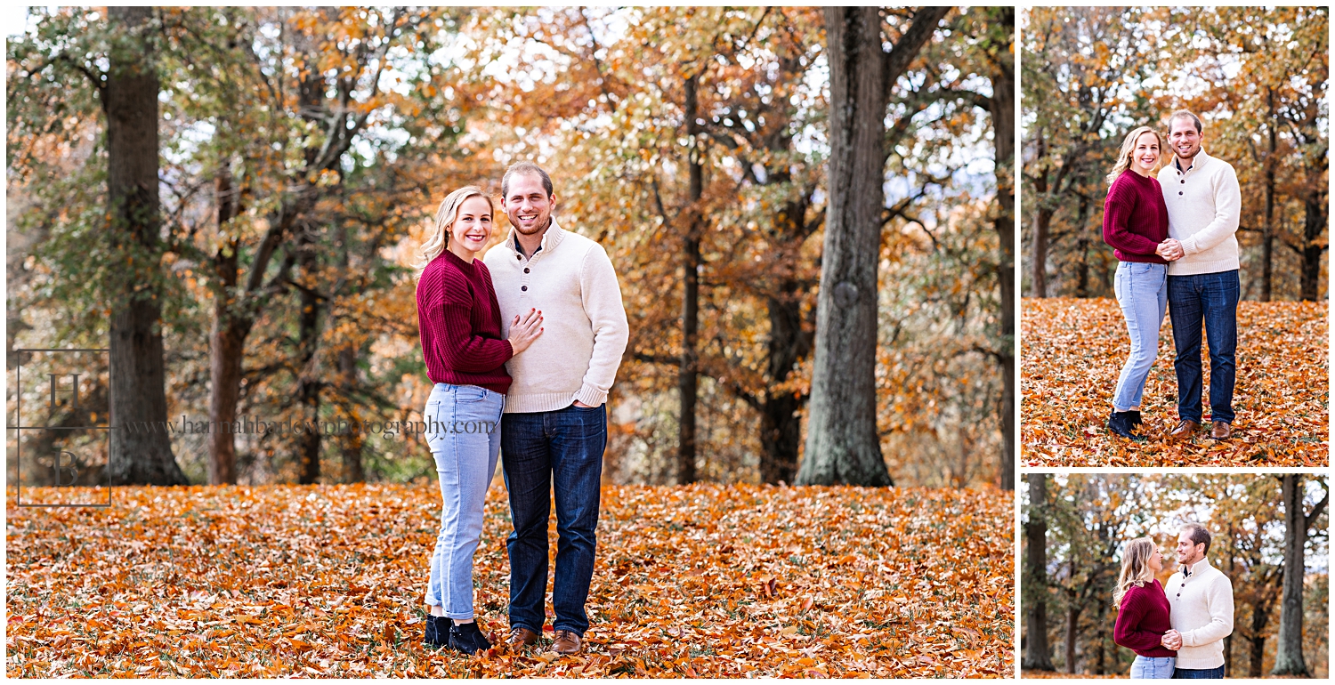 Lady in burgundy sweater poses wit man in white sweater in fall leaves