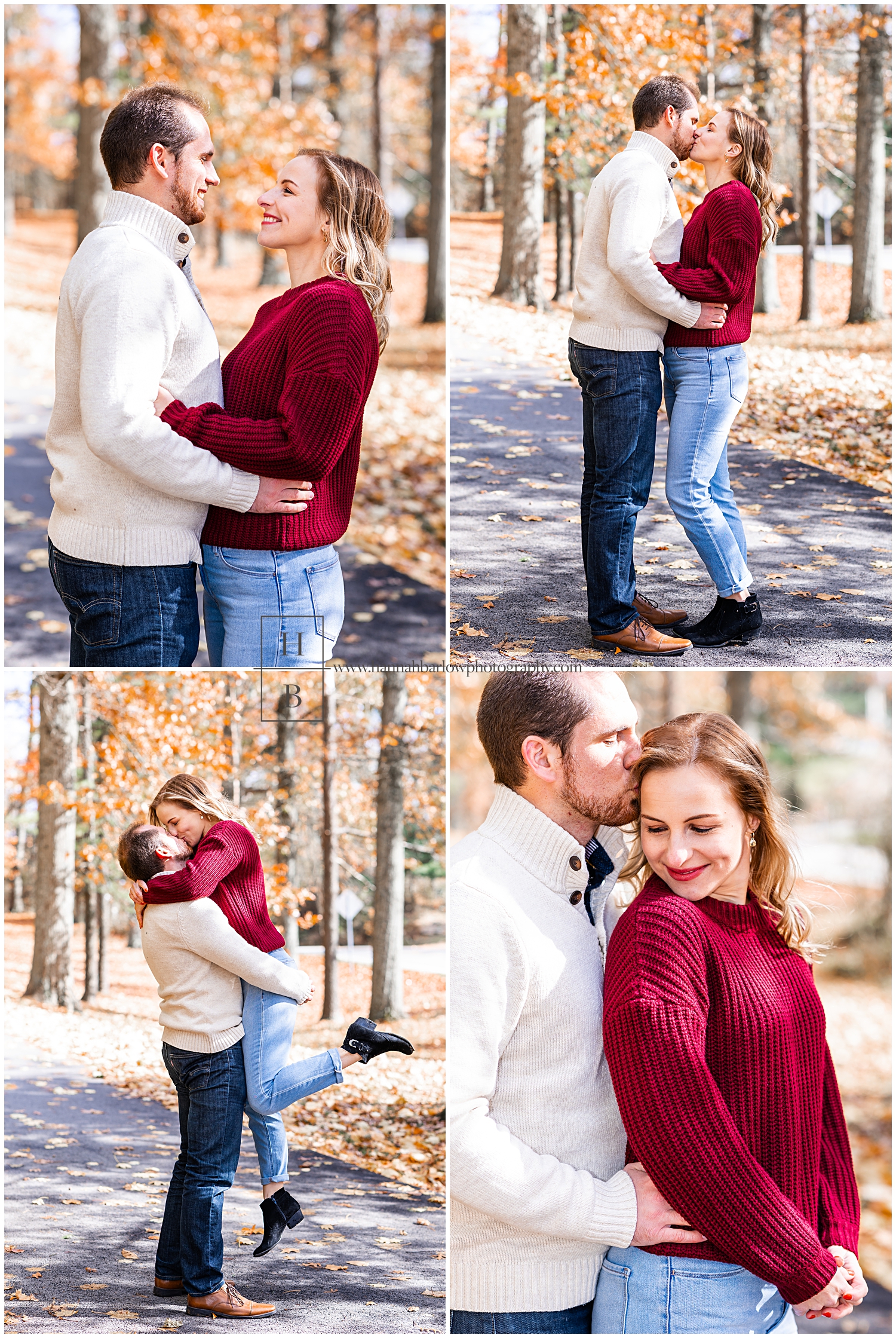 Couple stands on asphalt path in fall foliage forest for engagement photos.