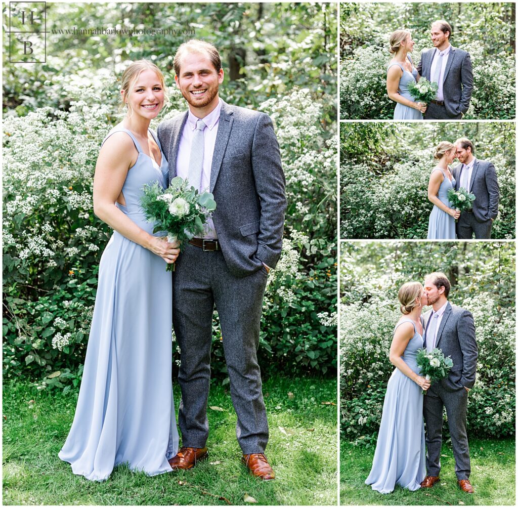 Bridesmaid in dusty blue gown poses with boyfriend in grey tux