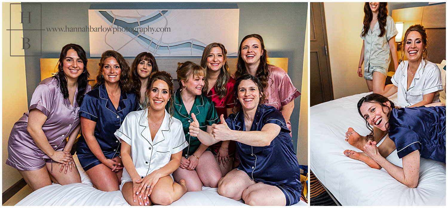 Bride and Bridesmaids sit on bed in matching pajamas.