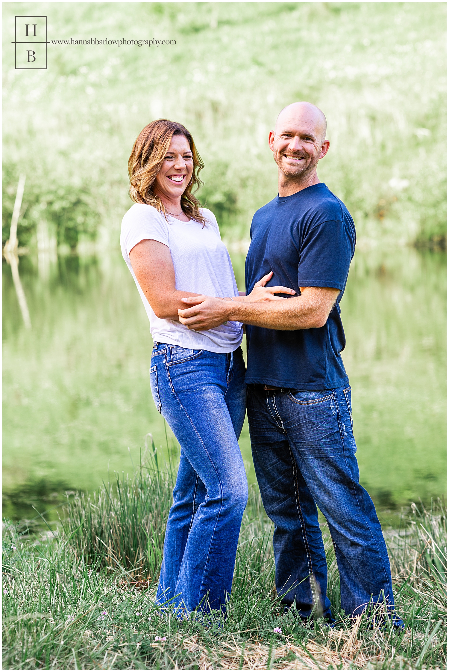 Couple poses and laughs for test photographer photos.