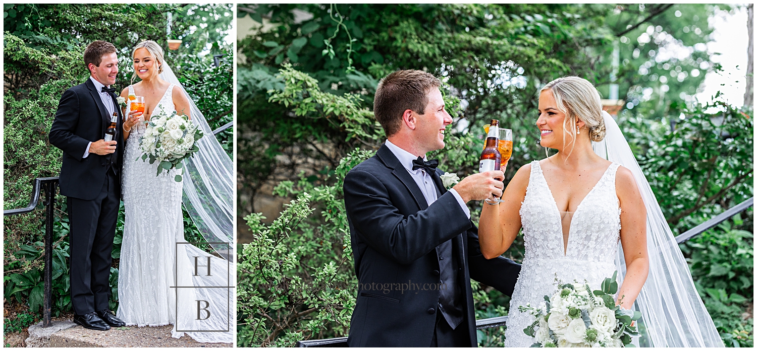 Bride and groom hold drinks and cheers