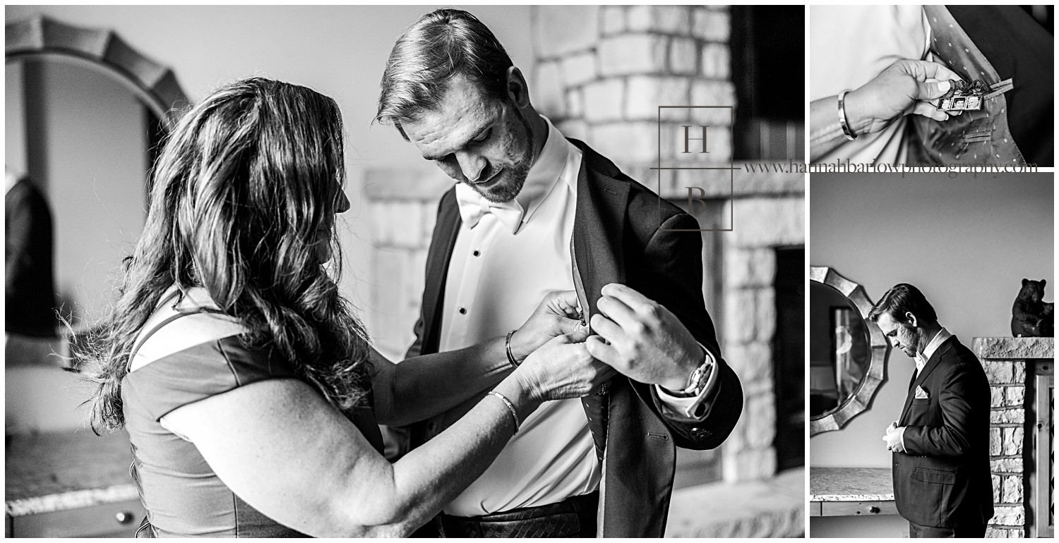 Mother of the groom helps groom pin heirlooms into his suit