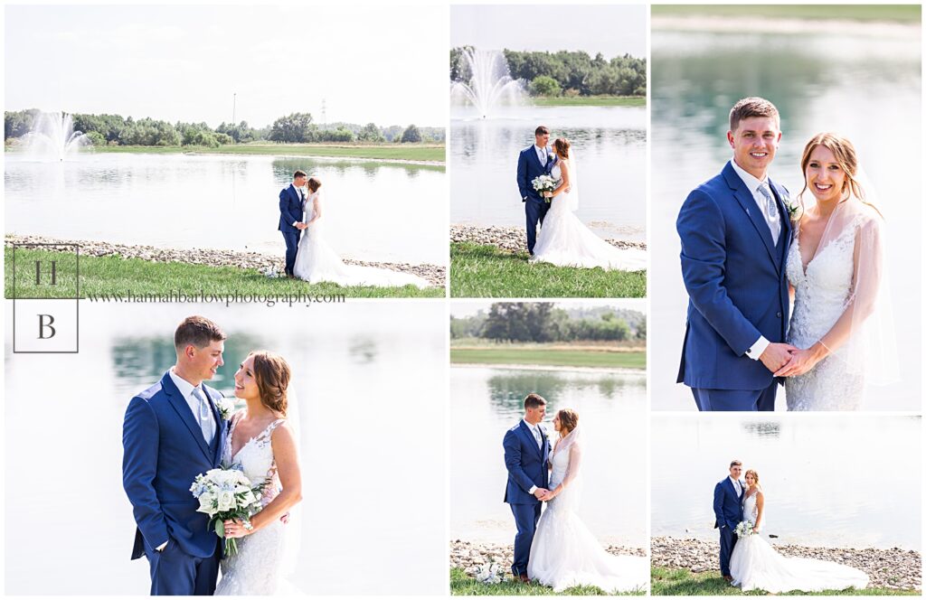 Couple poses for wedding photos by lake in bright sunlight