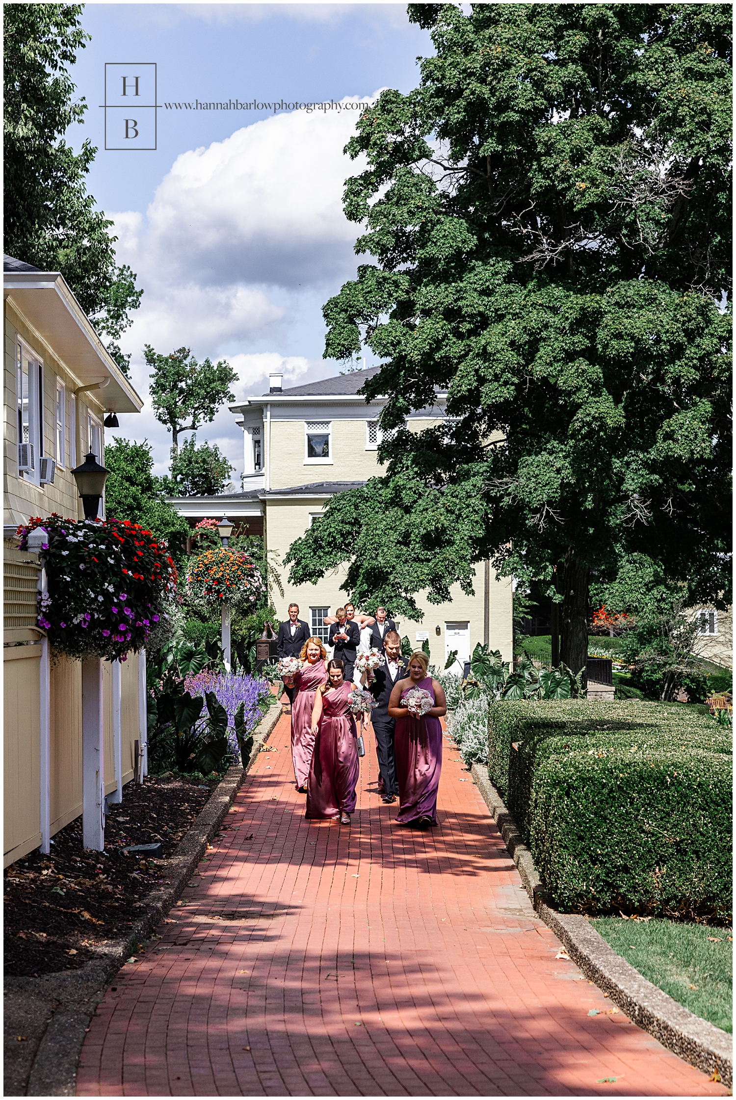 Bridal party walking on brick path