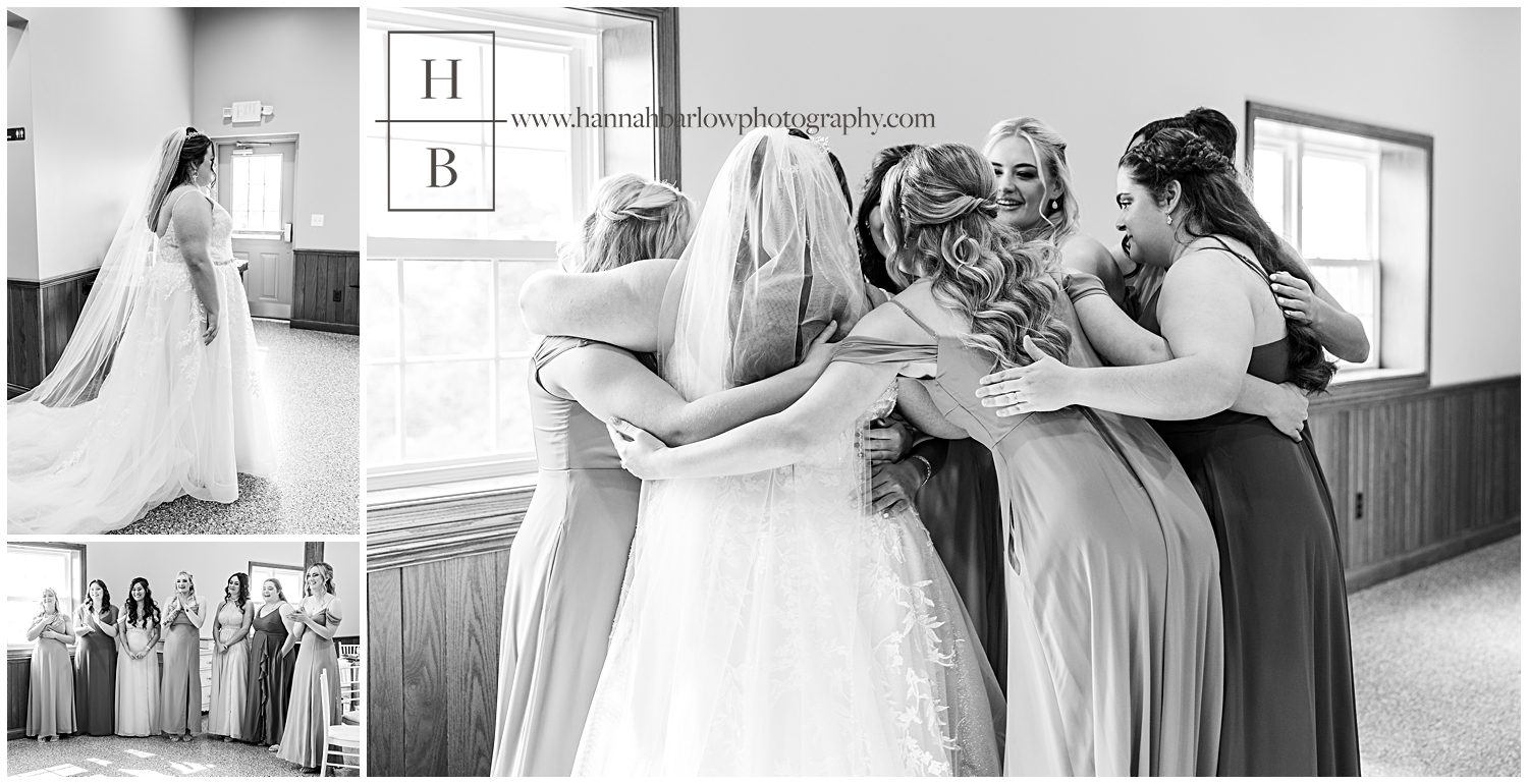 Black and white photo of bride hugging bridesmaids