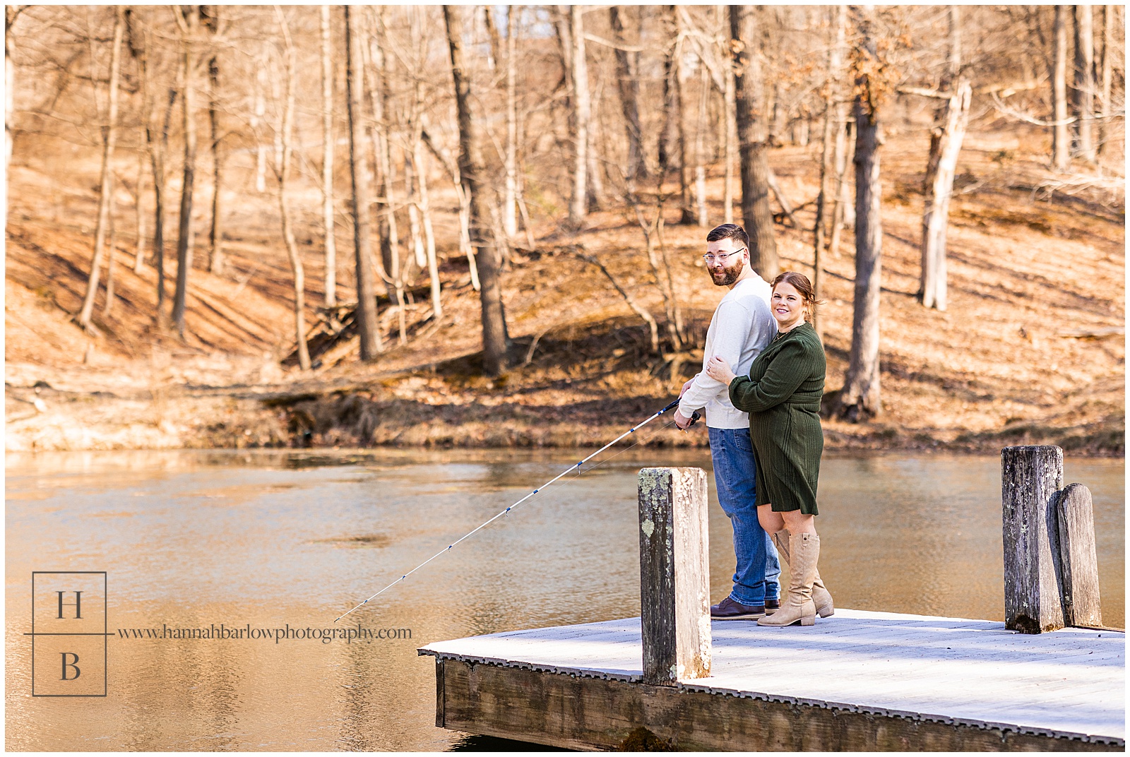 Couple poses on dock while fishing for engagement photos