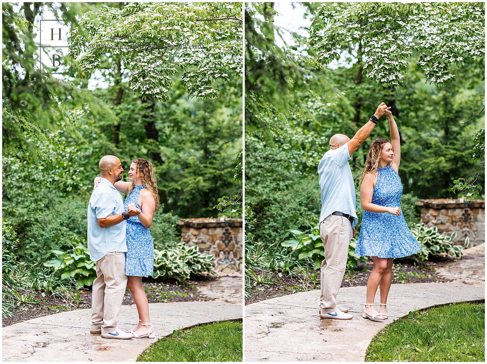 man and woman wear blue and dance in lush green for engagement photos