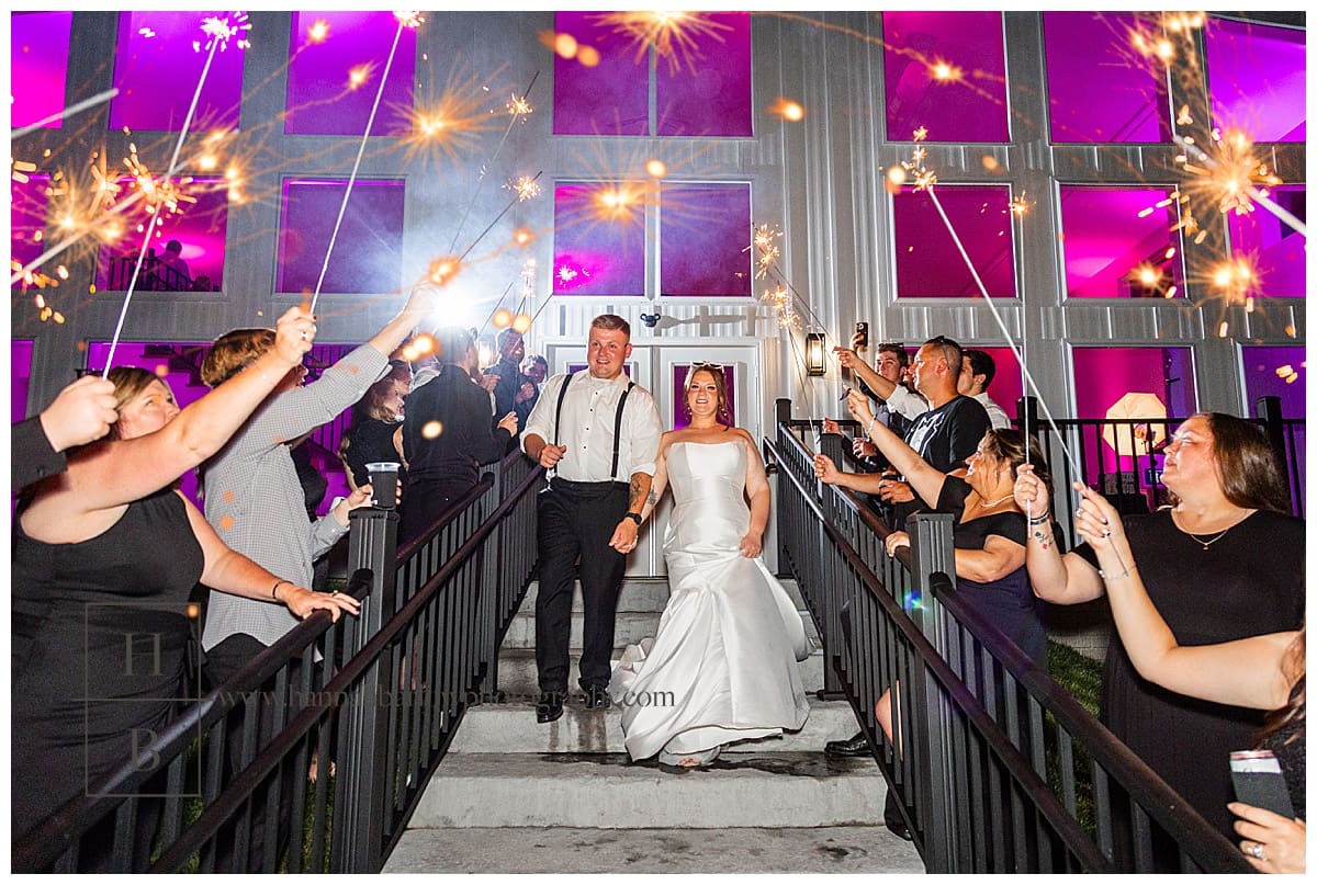 couple exits crescent acres in st Clairsville Ohio with sparkler exit