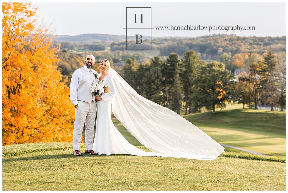 bride's veil flies for wedding photos