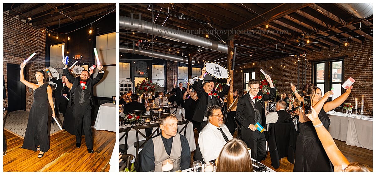 bridal party enters reception blowing bubbles and holding signs