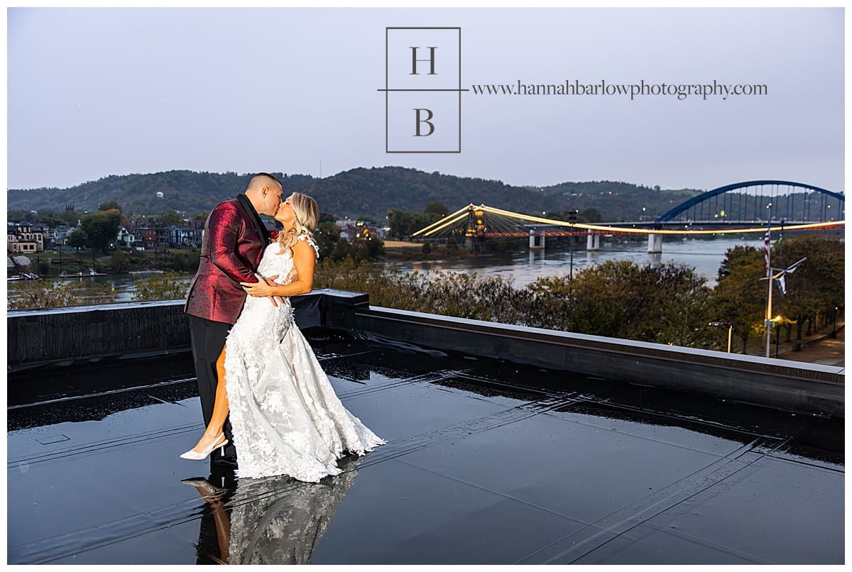 groom dips and kisses bride