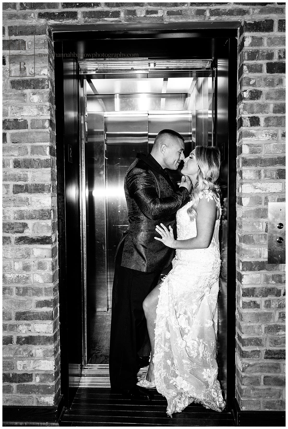 black and white sexy elevator photo of bride and groom