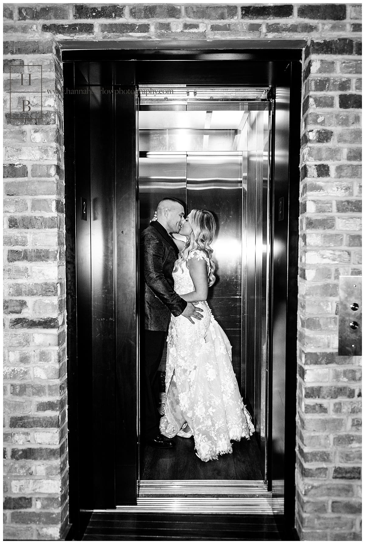 bride and groom kiss while elevator door closes