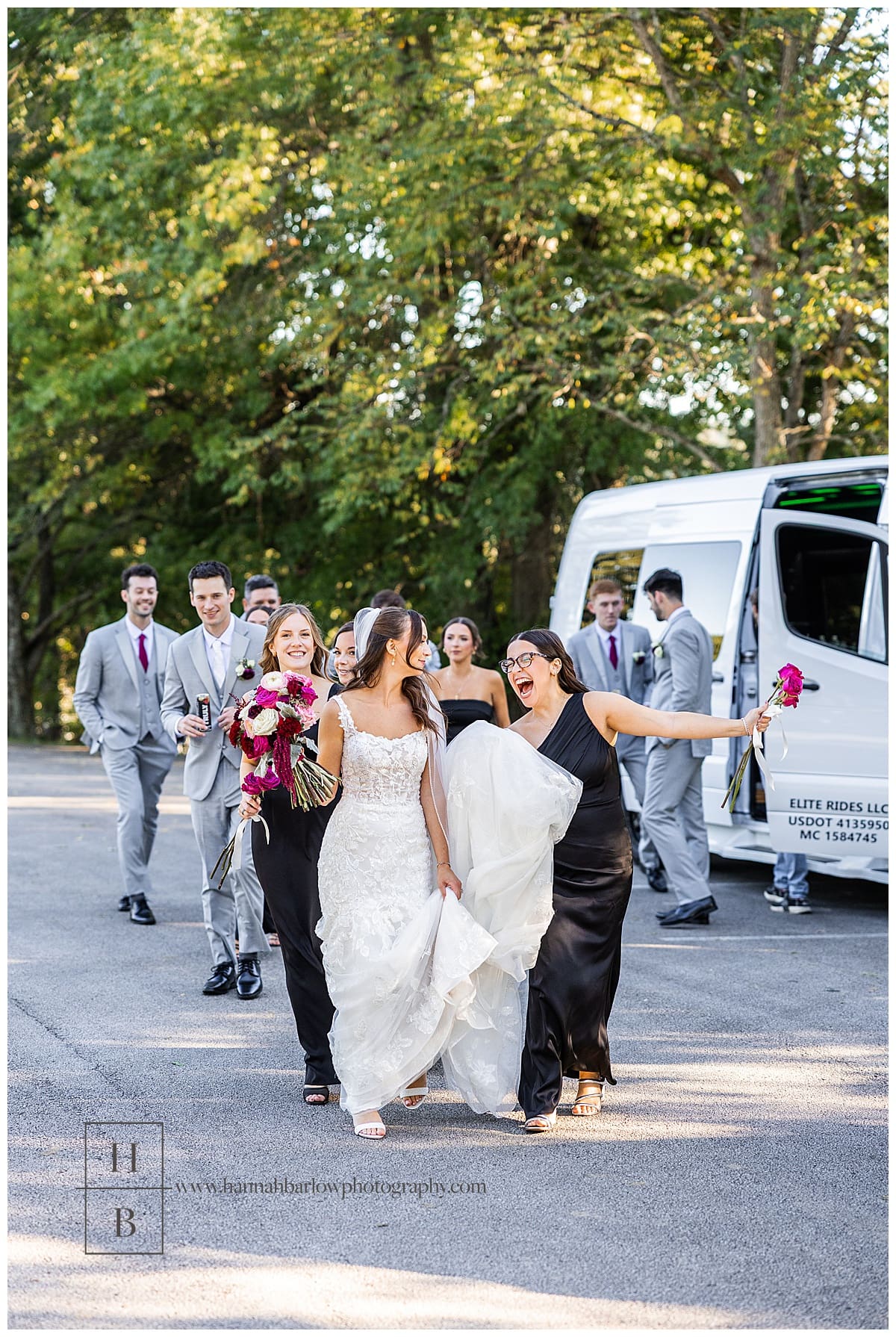 maid of honor walks holding bride's train